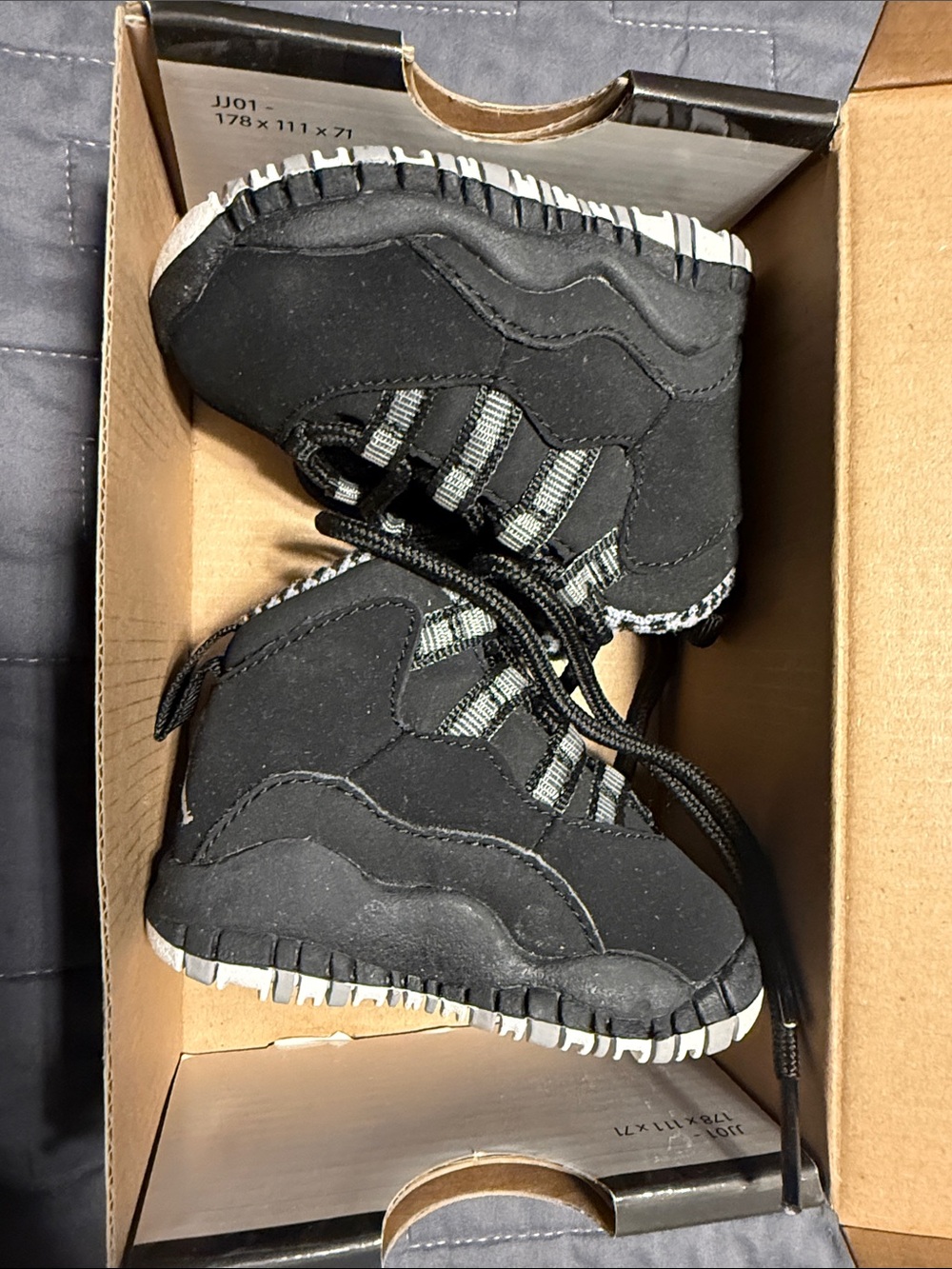 Jordan Kids Black and White High-Top Sneakers